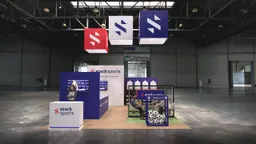 20x20 Island booth design by Reaction Space